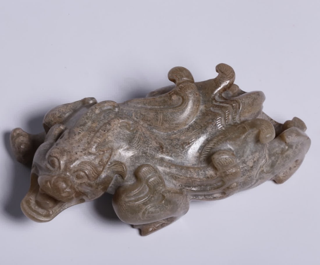 A Ming Dynasty Hetian jade beast (1 of 9)