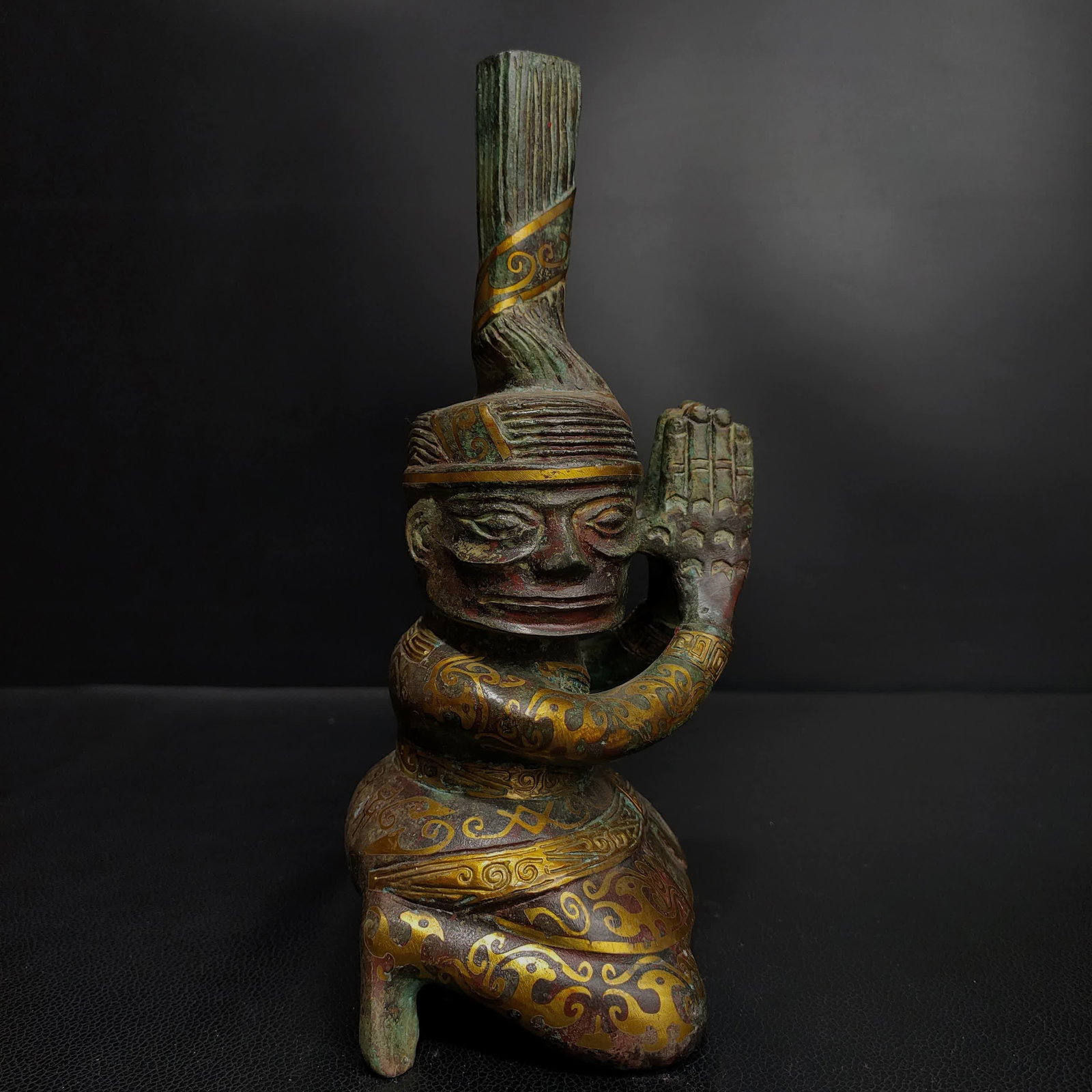 A Shang Dynasty bronze Cuojin kneeling figurine ornament: Shang Dynasty bronze Cuojin kneeling figurine ornament SIZE: L:13cm W:10cm H:25cm W:1.3kg (The Dimensions Of All Batches Are Manually Measured.If You Need More Detailed Information, Please Contact Our