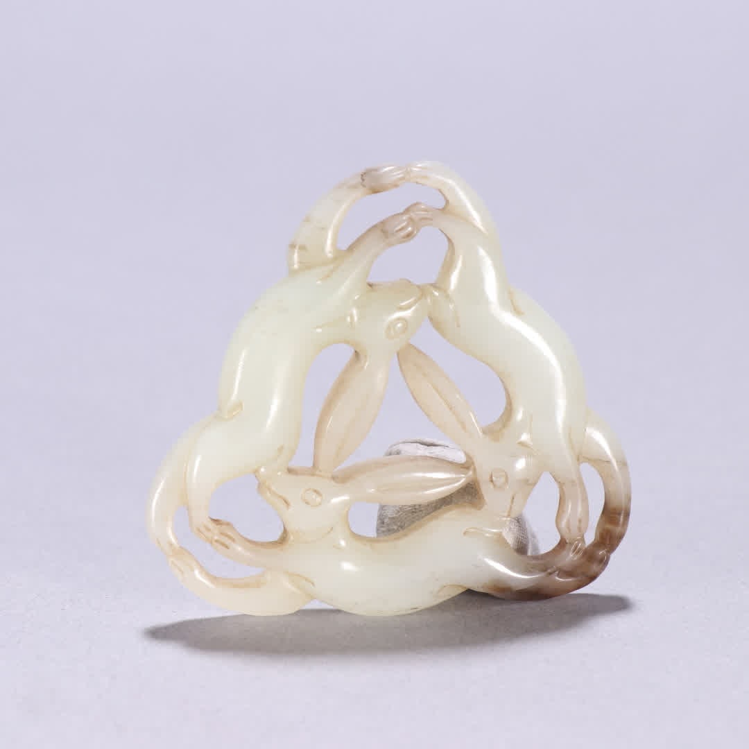 A Qing Dynasty Hetian jade three rabbit pendant: Qing Dynasty Hetian jade three rabbit pendant SIZE: W:5.4x5.8cm W:30g (The Dimensions Of All Batches Are Manually Measured.If You Need More Detailed Information, Please Contact Our Customer Service Be