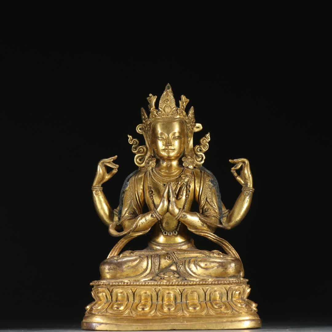 A Qing Dynasty bronze gilt four-armed Guanyin statue: Qing Dynasty copper gilt four-armed Guanyin statue SIZE: H:15.5cm W:10.7cm W:1030g (The Dimensions Of All Batches Are Manually Measured.If You Need More Detailed Information, Please Contact Our Custom