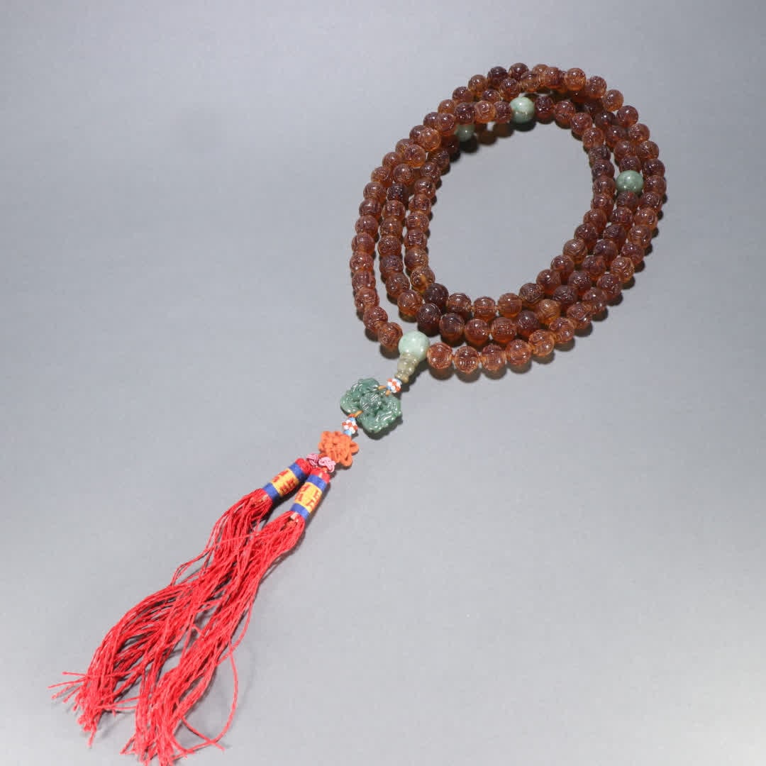 A Qing Dynasty amber group longevity pattern 108 Buddha beads (1 of 9)
