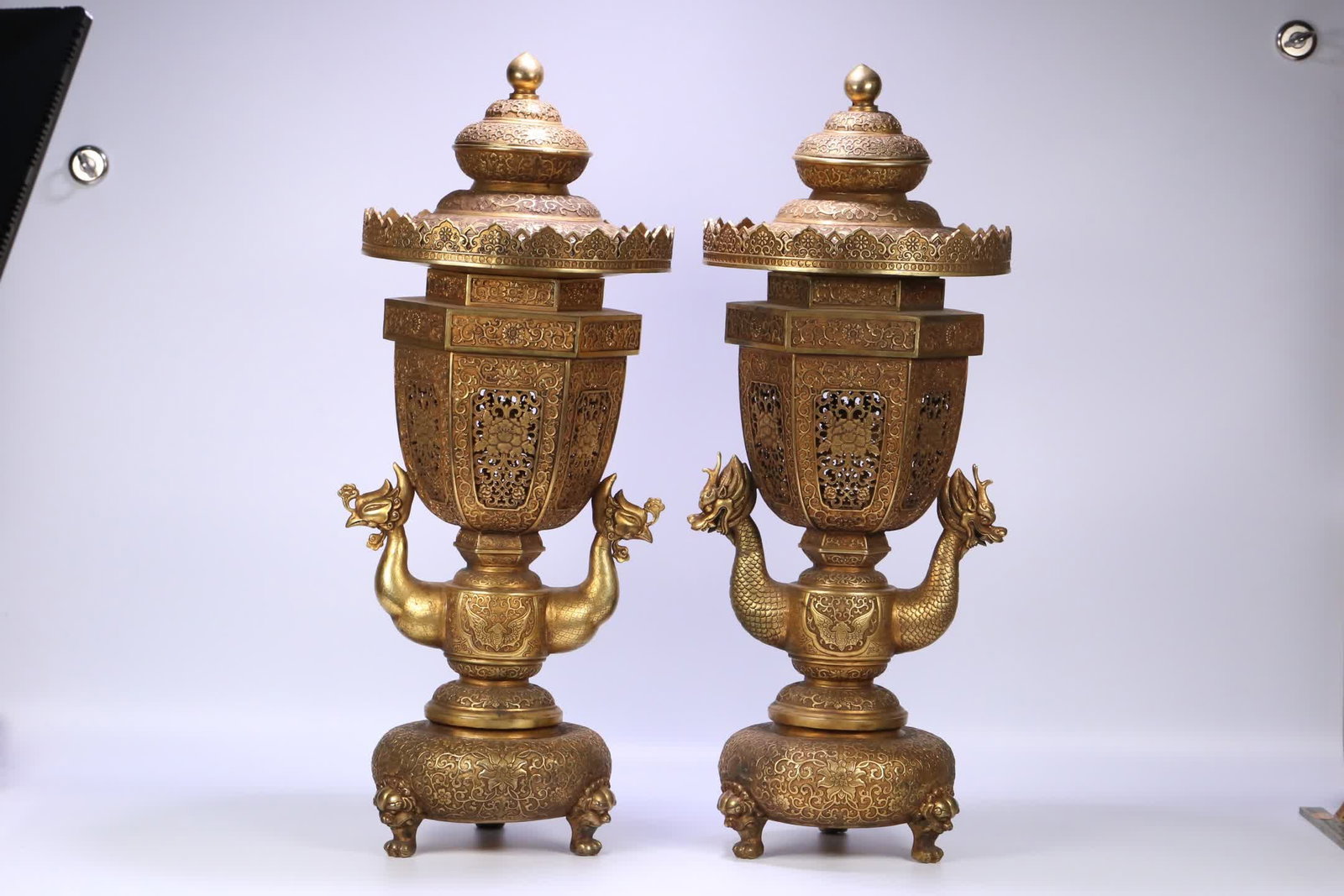 A pair of copper-gilt entwined lotus pattern dragon and phoenix smokers (1 of 9)