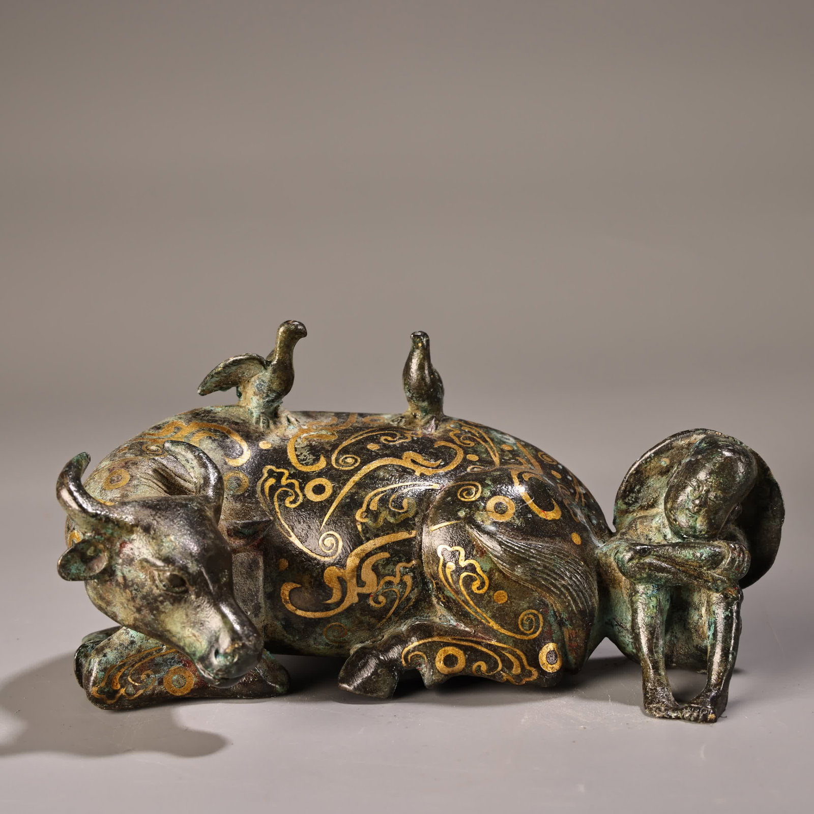 A bronze Cuojin shepherd cow of the Han Dynasty (1 of 9)