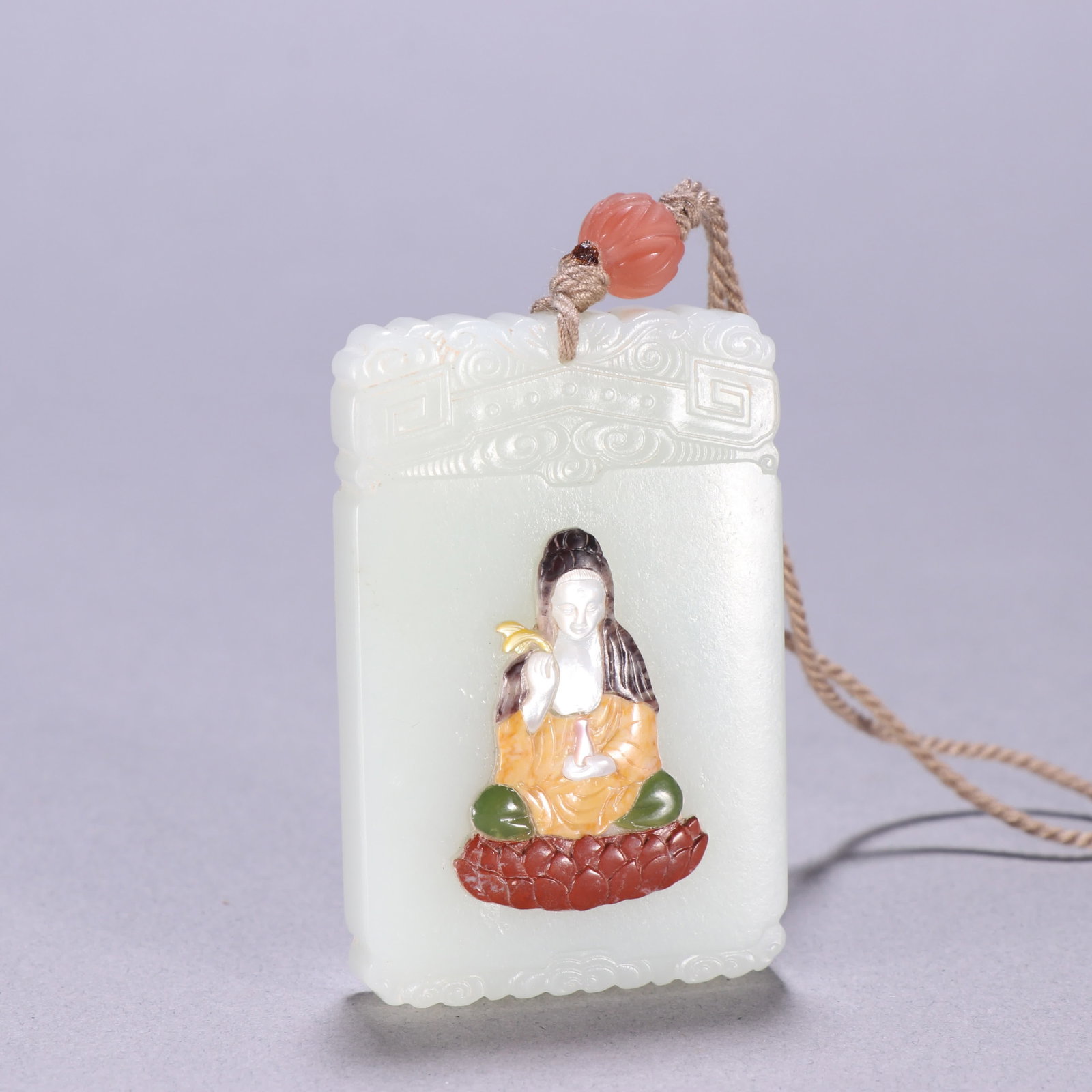A Qing Dynasty Hetian jade inlaid with a hundred treasures Guanyin listed: Qing Dynasty Hetian jade inlaid treasure Guanyin listing SIZE: H:6.1cm W:3.9cm W:66.9g (The Dimensions Of All Batches Are Manually Measured.If You Need More Detailed Information, Please Contact Our Cu