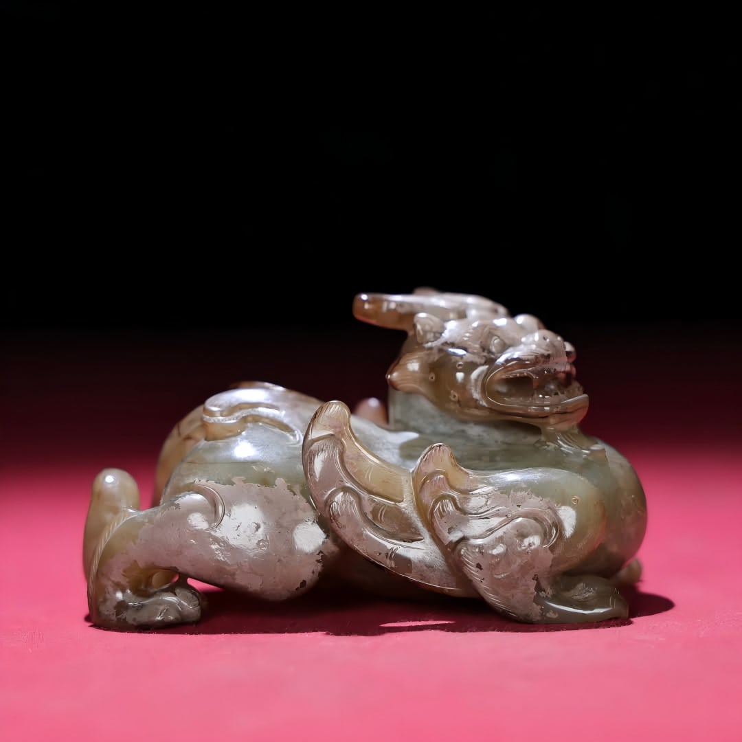 A Han Dynasty jade beast: Han Dynasty jade beast SIZE: 81x49x43mm W:183g (The Dimensions Of All Batches Are Manually Measured.If You Need More Detailed Information, Please Contact Our Customer Service Before Bidding.)