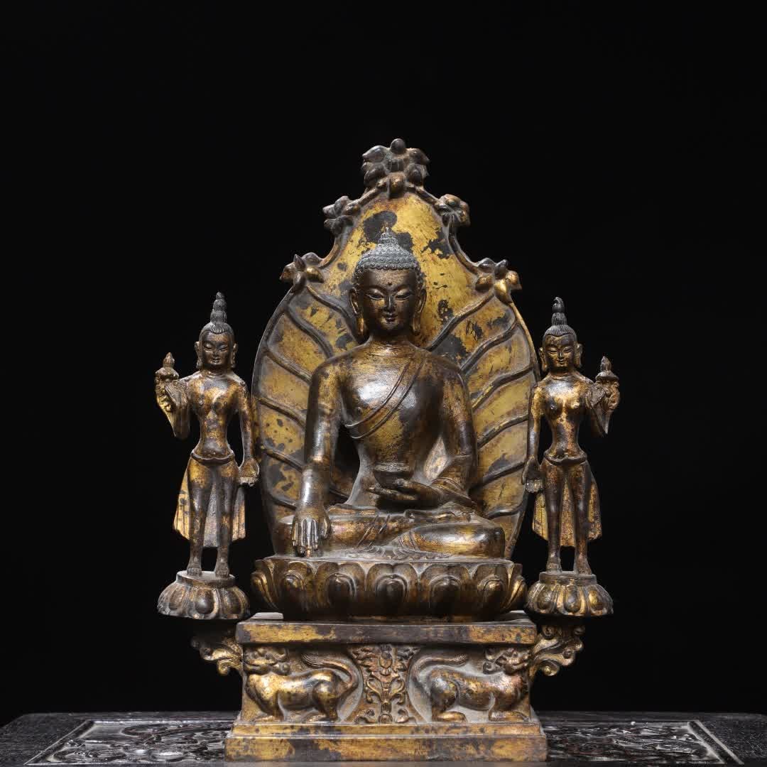 A statue of one Buddha and two disciples of Amitabha Buddha in the Northern Wei Dynasty (1 of 9)