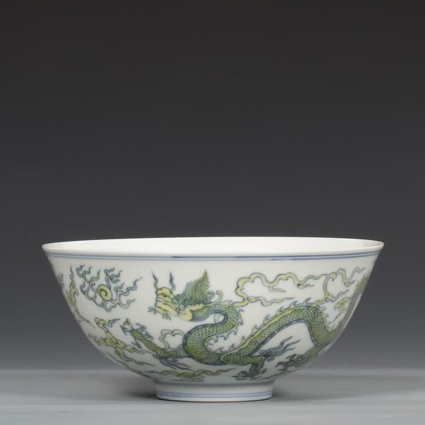 A Ming Dynasty Chenghua yellow dragon pattern bowl: Ming Dynasty Chenghua yellow dragon pattern bowl SIZE: H:7cm MouthD:15.5cm (The Dimensions Of All Batches Are Manually Measured.If You Need More Detailed Information, Please Contact Our Customer Servi