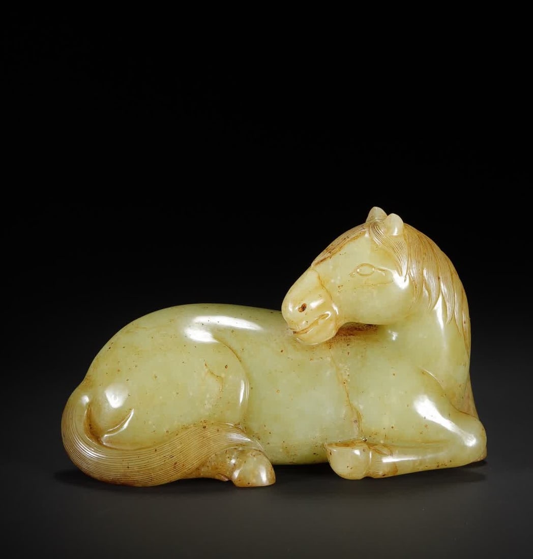 A Qing Dynasty Hetian topaz lying horse ornament: Qing Dynasty Hetian topaz reclining horse ornament SIZE: 11.2x4.0x6.6cm W:342g (The Dimensions Of All Batches Are Manually Measured.If You Need More Detailed Information, Please Contact Our Customer S