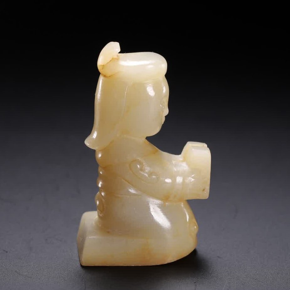 A Ming Dynasty Hetian jade figurine (1 of 9)