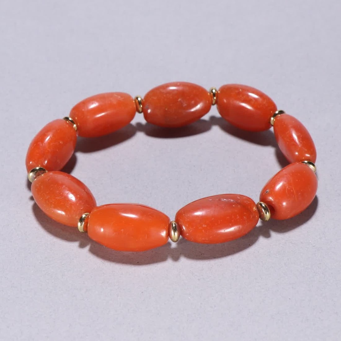 A Qing Dynasty southern red bracelet: Qing Dynasty Nanhong bracelet SIZE: W:2.2x1.4cm W:47.7g (The Dimensions Of All Batches Are Manually Measured.If You Need More Detailed Information, Please Contact Our Customer Service Before Bidding.)