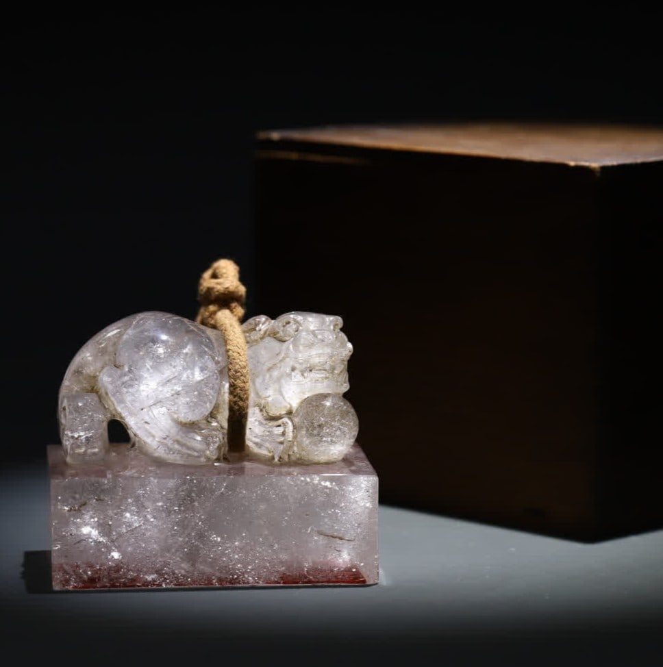 A Qing Dynasty crystal beast button square seal (1 of 9)