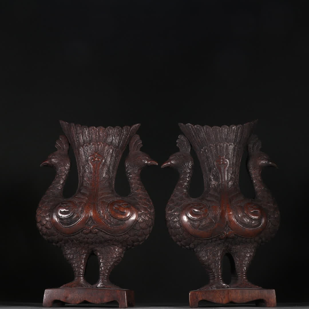 A pair of Qing Dynasty agarwood double phoenix vases (1 of 9)