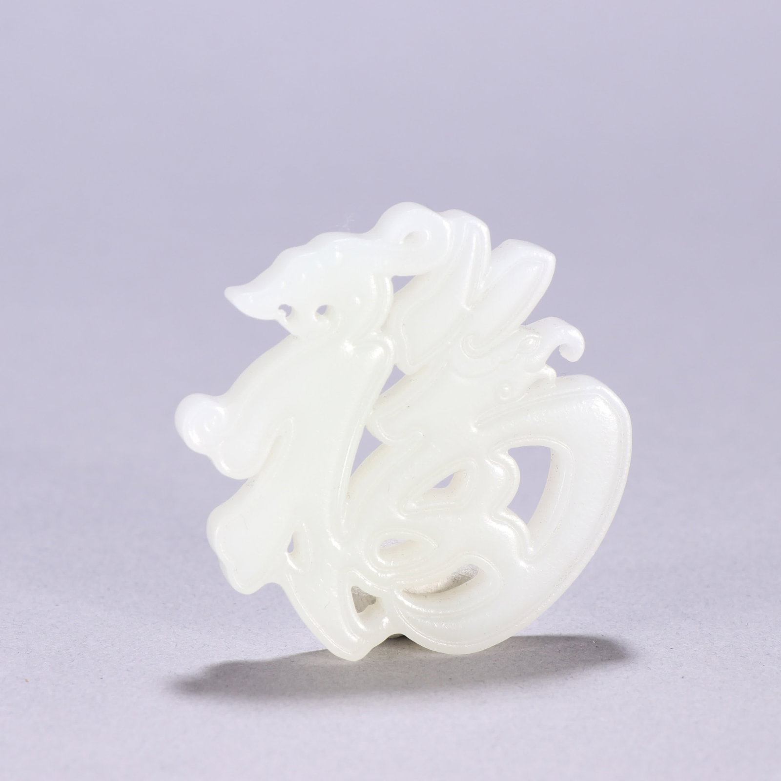 A Qing Dynasty Hetian jade dragon pattern Fuzi pendant: Qing Dynasty Hetian jade dragon pattern Fuzi pendant SIZE: H:4.9cm W:4.7cm W:26.7g (The Dimensions Of All Batches Are Manually Measured.If You Need More Detailed Information, Please Contact Our Custom