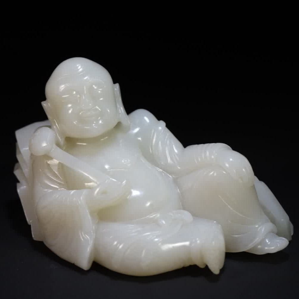 A Qing Dynasty jade arhat holding a ruyi furnisher (1 of 9)