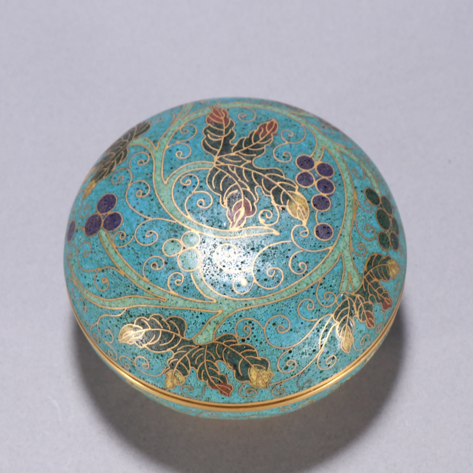 A Qing Dynasty copper gilt cloisonnegrape-patterned lid box (1 of 9)