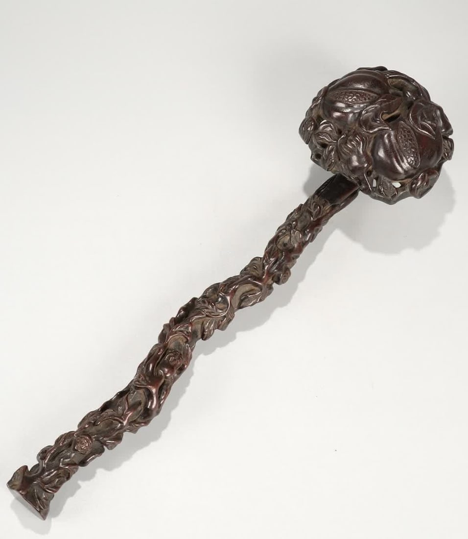 A Qing Dynasty rosewood carving with three multi-pattern ruyi: Qing Dynasty rosewood carving three multi-pattern ruyi SIZE: L:34cm W:9cm W:216.5g (The Dimensions Of All Batches Are Manually Measured.If You Need More Detailed Information, Please Contact Our Custom