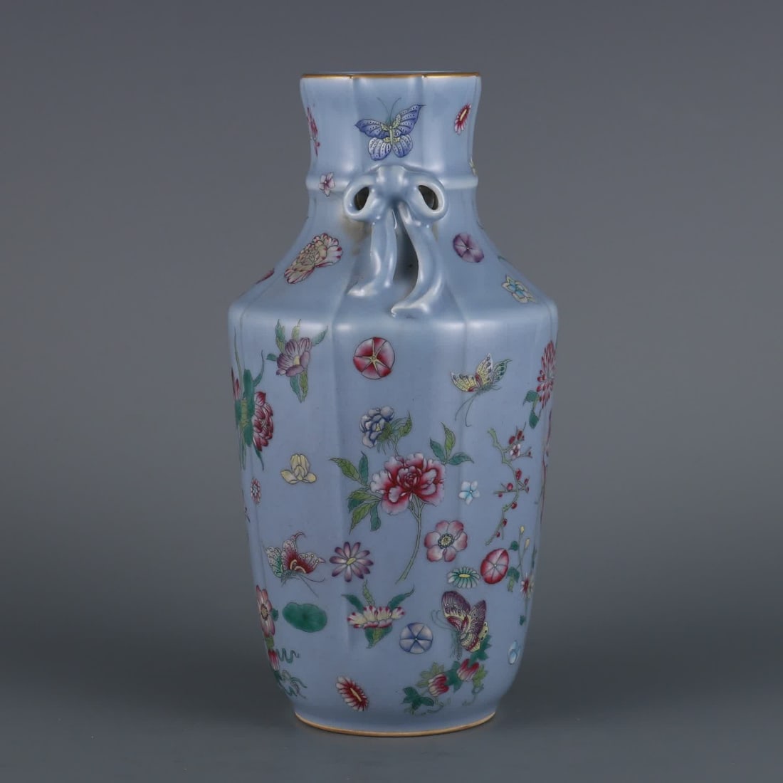A piece of Qing Dynasty Qianlong year sky blue glaze with pastel butterfly love flower streamer: Qing Dynasty Qianlong year sky blue glaze plus pastel butterfly love flower streamer melon lingzun SIZE: H:23.3cm MouthD:6.5cm (The Dimensions Of All Batches Are Manually Measured.If You Need More Det
