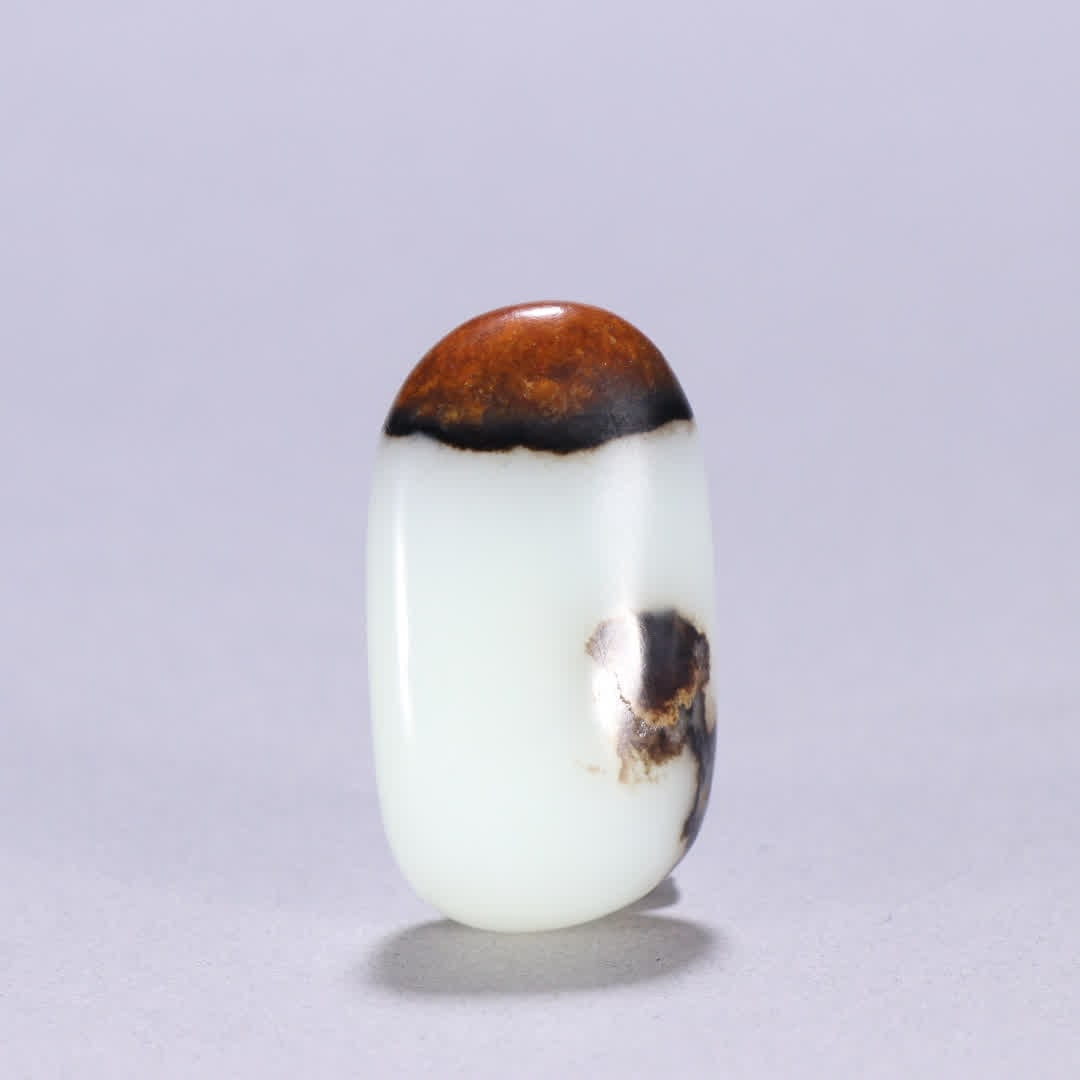 A piece of Hetian jade seed material rough: Hetian jade seed material rough SIZE: W:4.5x2.4cm W:31g (The Dimensions Of All Batches Are Manually Measured.If You Need More Detailed Information, Please Contact Our Customer Service Before Bidding.)