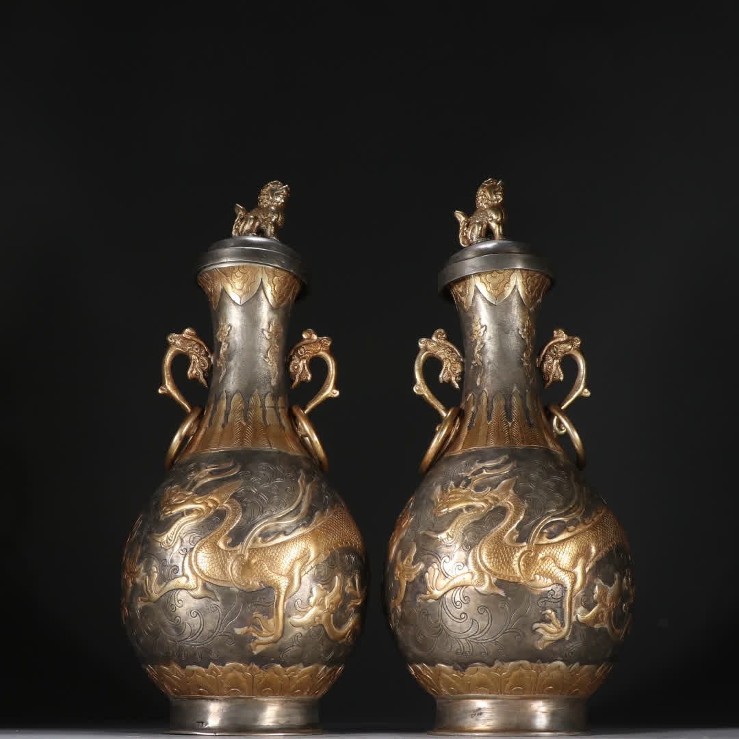 A pair of Qing Dynasty copper-gilt gilt silver dragon-patterned double-eared ring bottles: A pair of Qing Dynasty copper-gilt gilt silver dragon-patterned double-ear ring bottles SIZE: H: 30cm W: 12.5cm Single W: 1180.2g (The Dimensions Of All Batches Are Manually Measured.If You Need More