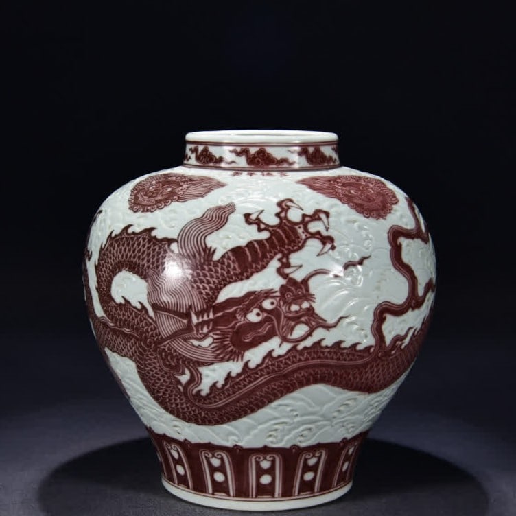 A Ming Dynasty Xuande carved seawater glazed red dragon pattern jar: Ming Dynasty Xuande carved seawater glaze red dragon pattern jar SIZE: H:34cm W:34cm (The Dimensions Of All Batches Are Manually Measured.If You Need More Detailed Information, Please Contact Our
