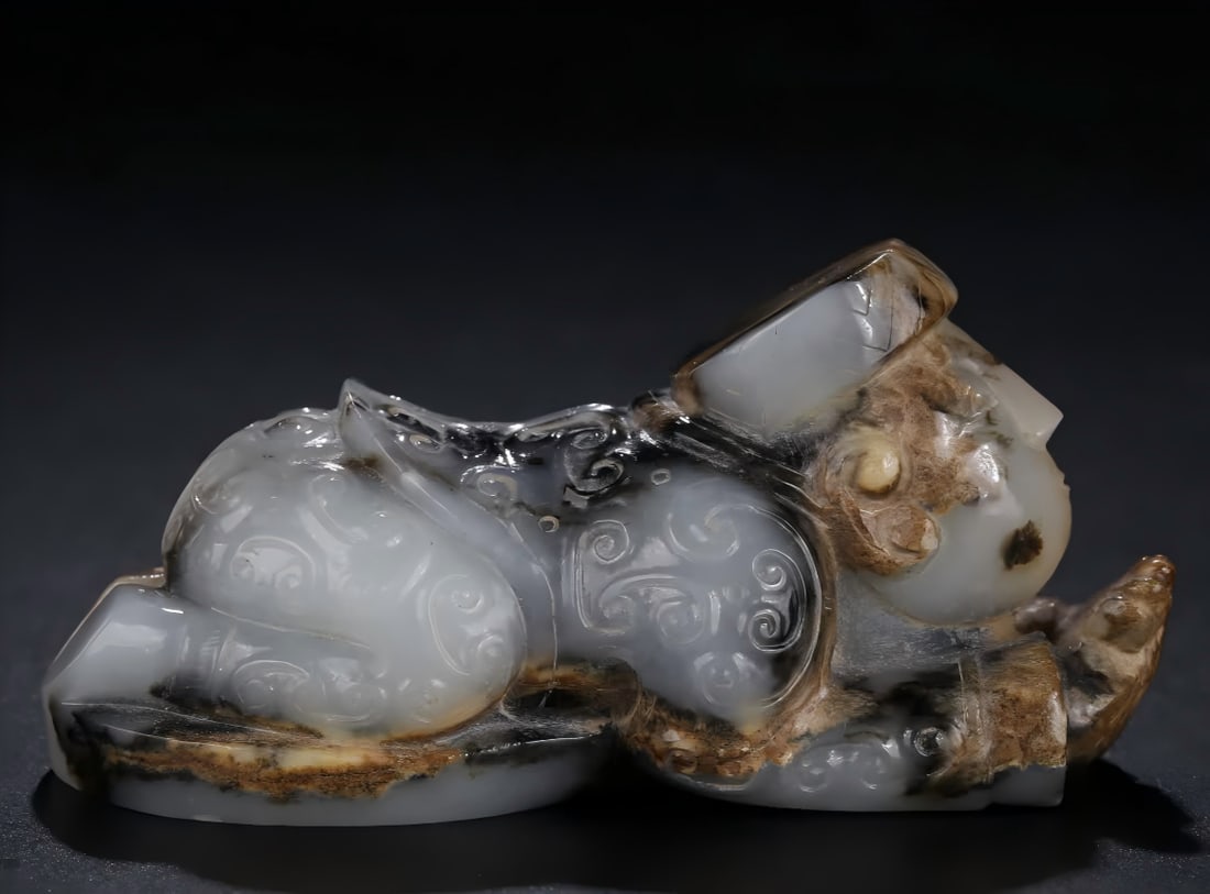 A piece of Hetian black and white jade belt during the Shang and Zhou dynasties (1 of 9)