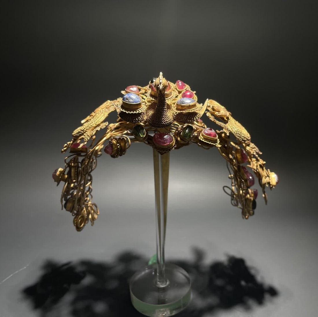A Qing Dynasty silver-gilt inlaid gemstone dragon and phoenix hairpin (1 of 10)
