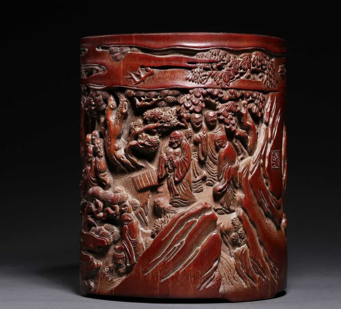 A Qing Dynasty bamboo carving eighteen Arhat pen holder: Qing Dynasty bamboo carving eighteen Arhat pen holder SIZE: H:16cm D:13cm W:410g (The Dimensions Of All Batches Are Manually Measured.If You Need More Detailed Information, Please Contact Our Customer