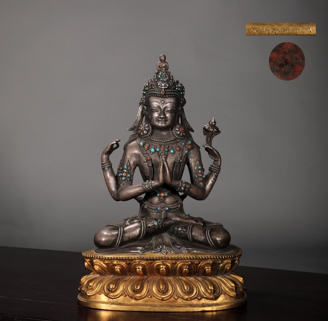 A Ming Dynasty silver-gilt four-armed Guanyin seated statue (1 of 9)