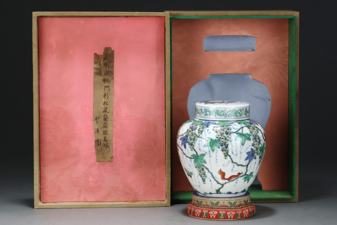 An Exquisite Doucai Squirrel and Grapes Pattern Jar: An Exquisite Doucai Squirrel and Grapes Pattern Jar Ming Dynasty, China Chenghua Six-character Mark Size:13.8cmx13cm (The Dimensions Of All Batches Are Manually Measured.If You Need More Detailed Info