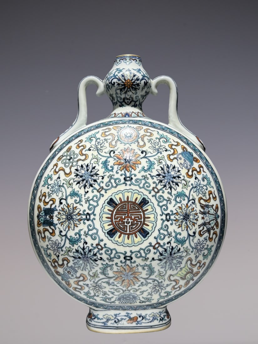 An Exquisite Doucai Lotus Pattern Eight Treasures Pattern Double-Ears Vase: An Exquisite Doucai Lotus Pattern Eight Treasures Pattern Double-Ears Vase Qing Dynasty, China Qianlong Six-character Mark Size:42cmx30cm (The Dimensions Of All Batches Are Manually Measured.If You Ne