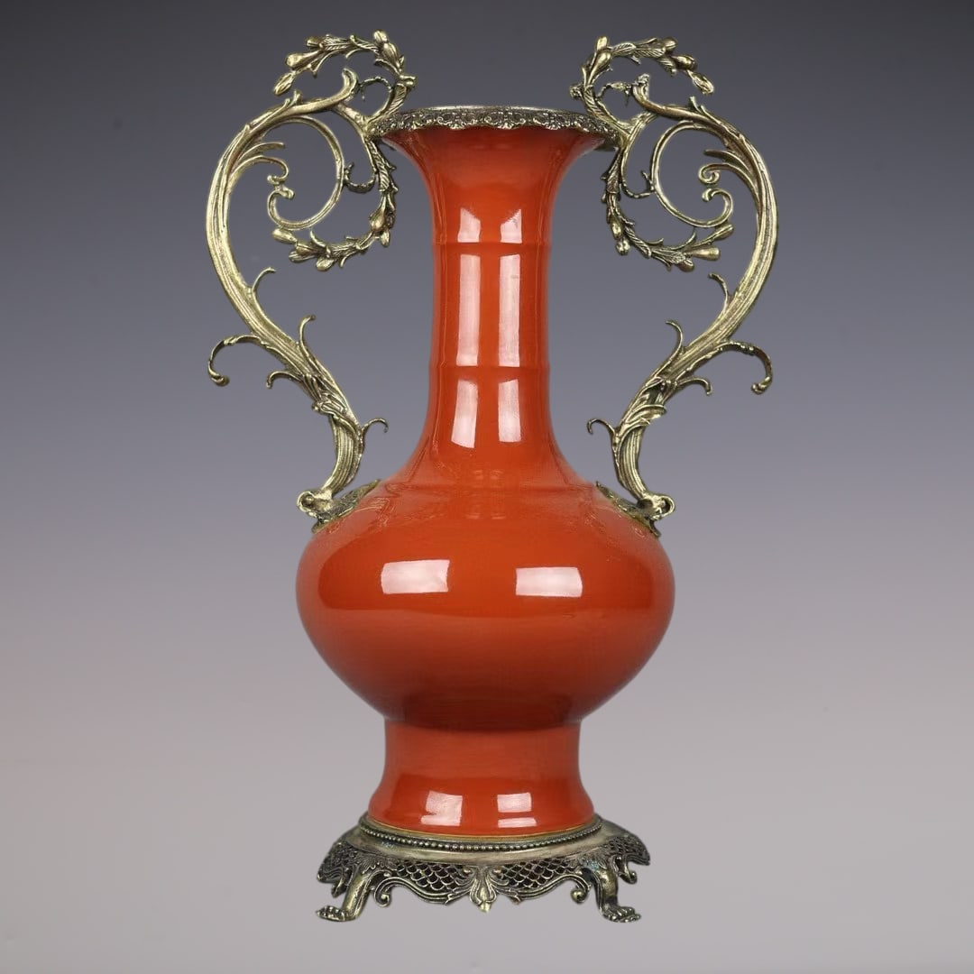 An Exquisite Red Glazed Inlaid Bronze Double-Ears Vase: An Exquisite Red Glazed Inlaid Bronze Double-Ears Vase Qing Dynasty, China Yongzheng Six-character Mark Size:41cmx27cm (The Dimensions Of All Batches Are Manually Measured.If You Need More Detailed