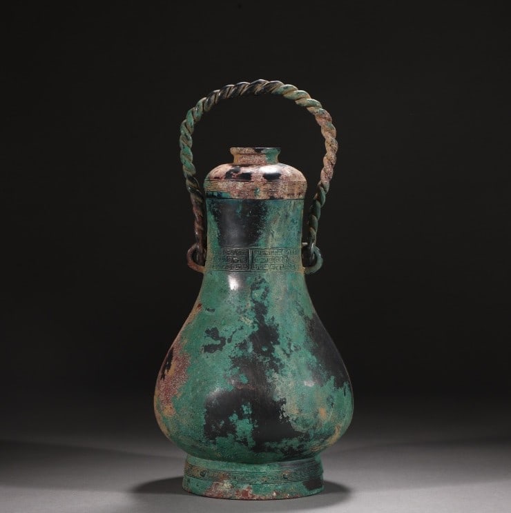 An Exquisite Bronze Beast-Face Pattern Vase: An Exquisite Bronze Beast-Face Pattern Vase N.Zhou , China Size:28cmx16cm Weight:2500g (The Dimensions Of All Batches Are Manually Measured.If You Need More Detailed Information, Please Contact Our Cu