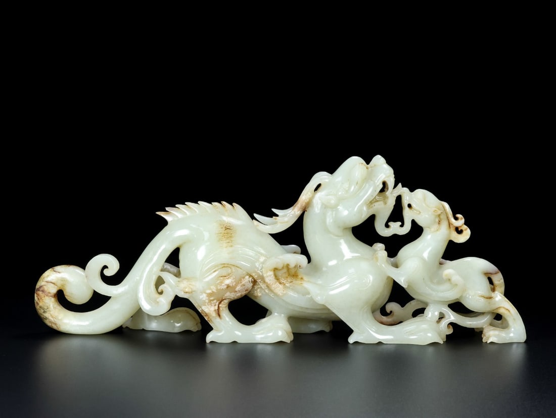 An Exquisite White Jade Dragon Ornament (1 of 9)