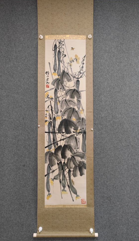 A Chinese Vertical Scroll Ink Painting of Figure Melon and Fruit on Paper: A Chinese Vertical Scroll Ink Painting of Figure Melon and Fruit on Paper Qi baishi Without frame Size:134.5cmx34cm (The Dimensions Of All Batches Are Manually Measured.If You Need More Detailed Infor