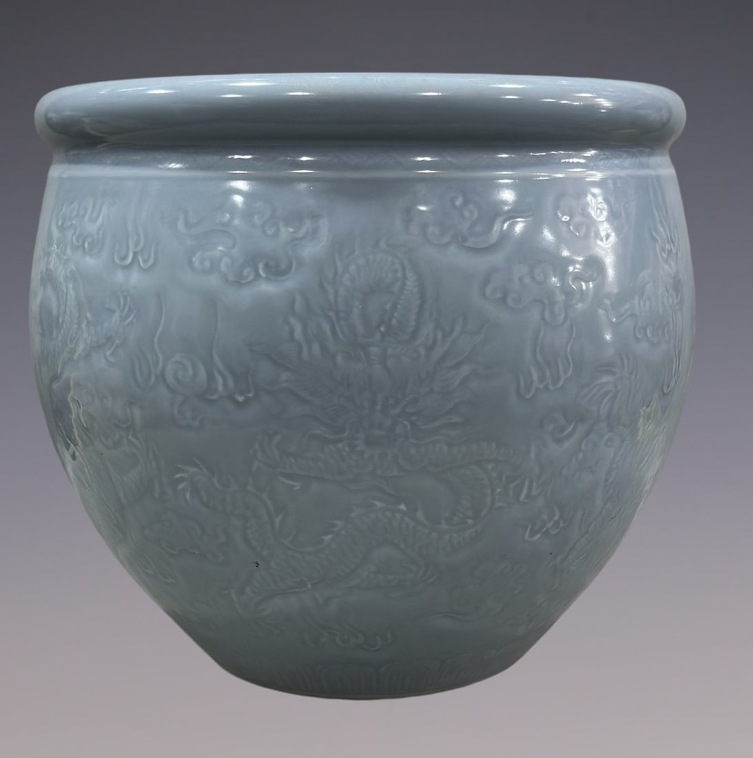 An Exquisite Sky Blue Glazed Dragon Pattern Vat: An Exquisite Sky Blue Glazed Dragon Pattern Vat Qing Dynasty, China Size:36cmx40cm (The Dimensions Of All Batches Are Manually Measured.If You Need More Detailed Information, Please Contact Our Custom