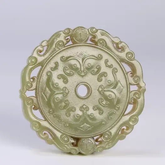 A fine Qing Dynasty Hetian yellow jade plaque with taotie phoenix patterns: Qing Dynasty Hetian yellow jade taotie phoenix-patterned plaqueSIZE:5.3x0.7cm W:36g(The Dimensions Of All Batches Are Manually Measured.If You Need More Detailed Information, Please Contact Our Custom