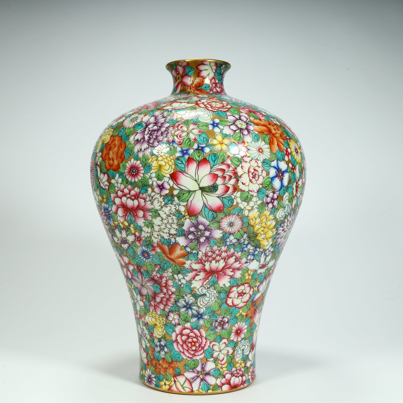 A beautiful famille rose plum vase with myriad flowers and earth-like patterns in the style of the (1 of 10)