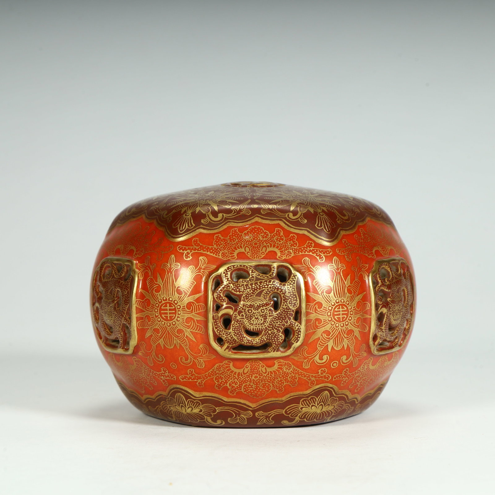 A beautiful Qing Dynasty Qianlong hand warmer with entwined floral patterns and openwork dragon (1 of 9)