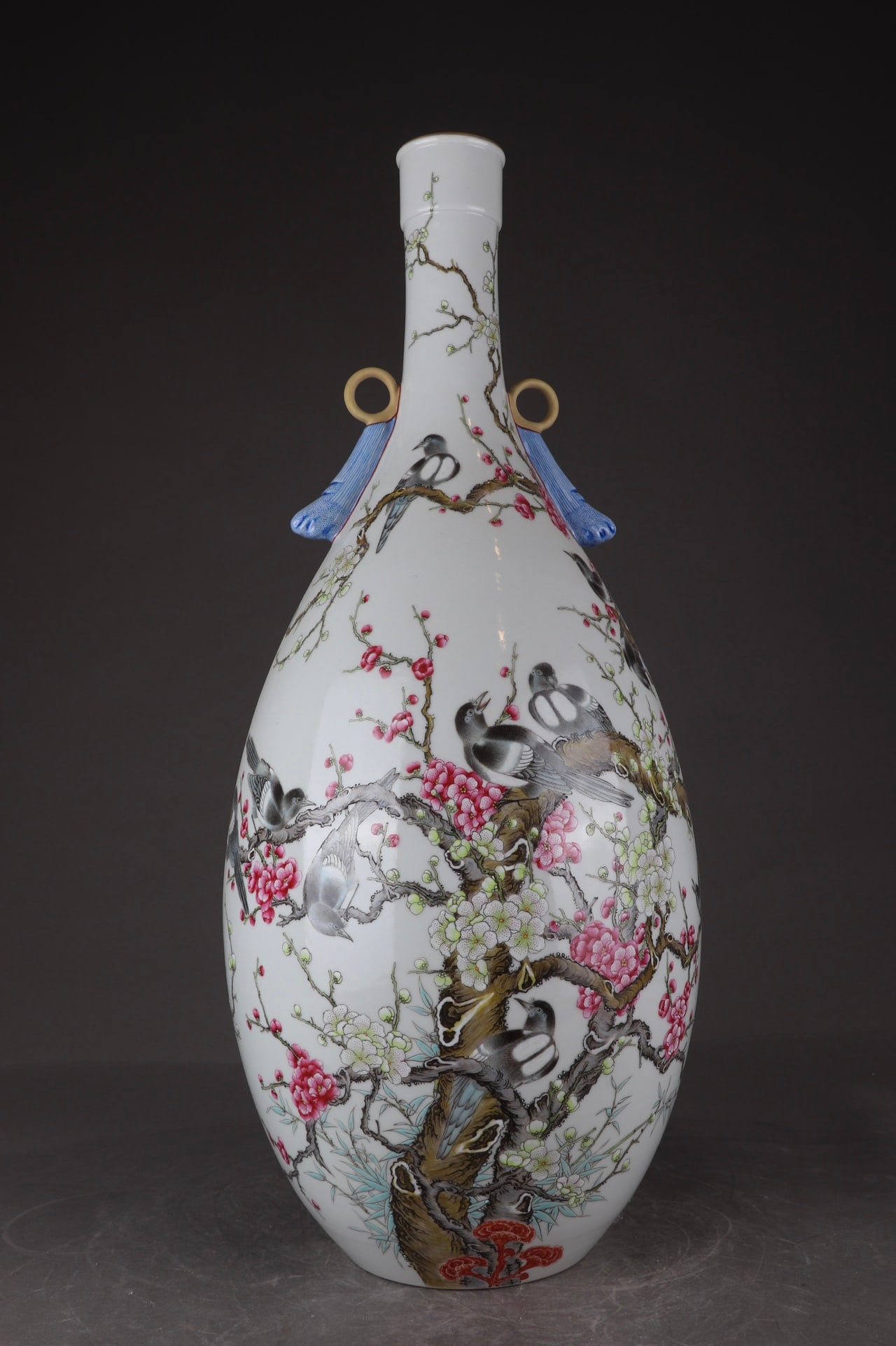 A fine Qing Dynasty Qianlong famille rose magpie and plum blossom double-handled vase: Qing Dynasty Qianlong period famille rose magpie and plum blossom double-handled vaseSIZE:H:59 cm D:24.5 cm(The Dimensions Of All Batches Are Manually Measured.If You Need More Detailed Information, P