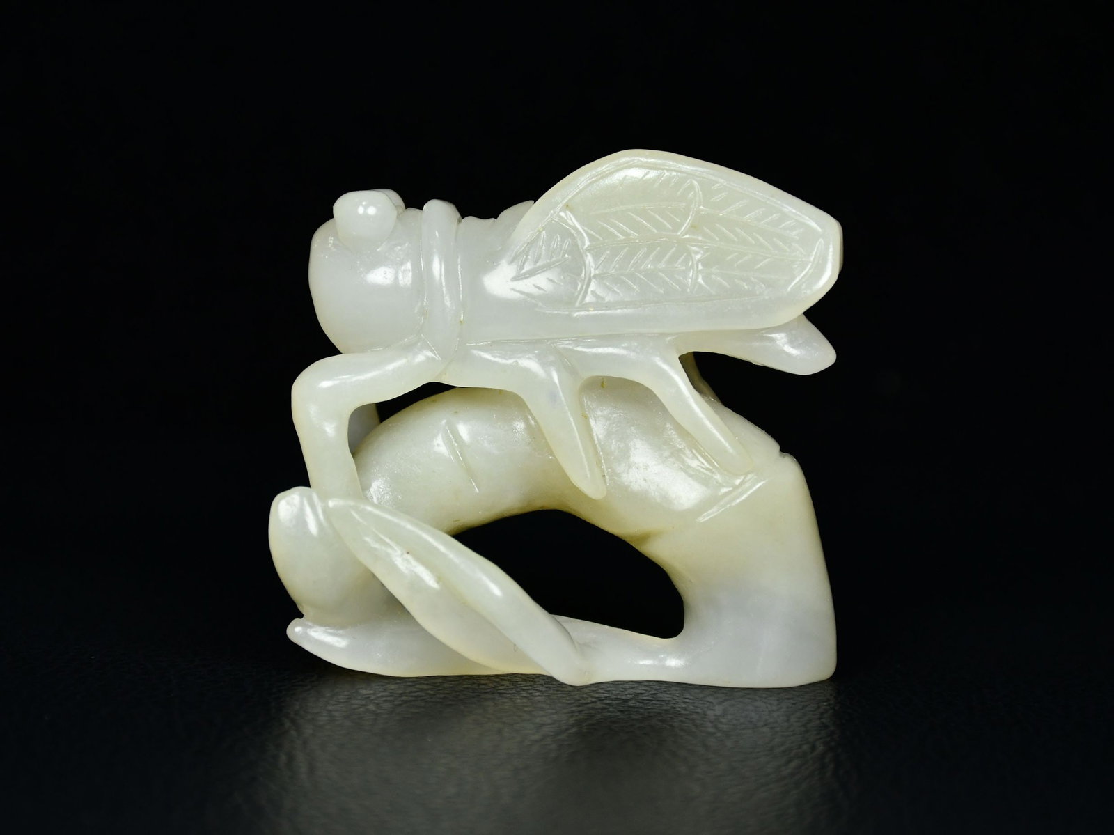 A fine Qing Dynasty Hetian white jade bamboo cicada handle piece (1 of 9)