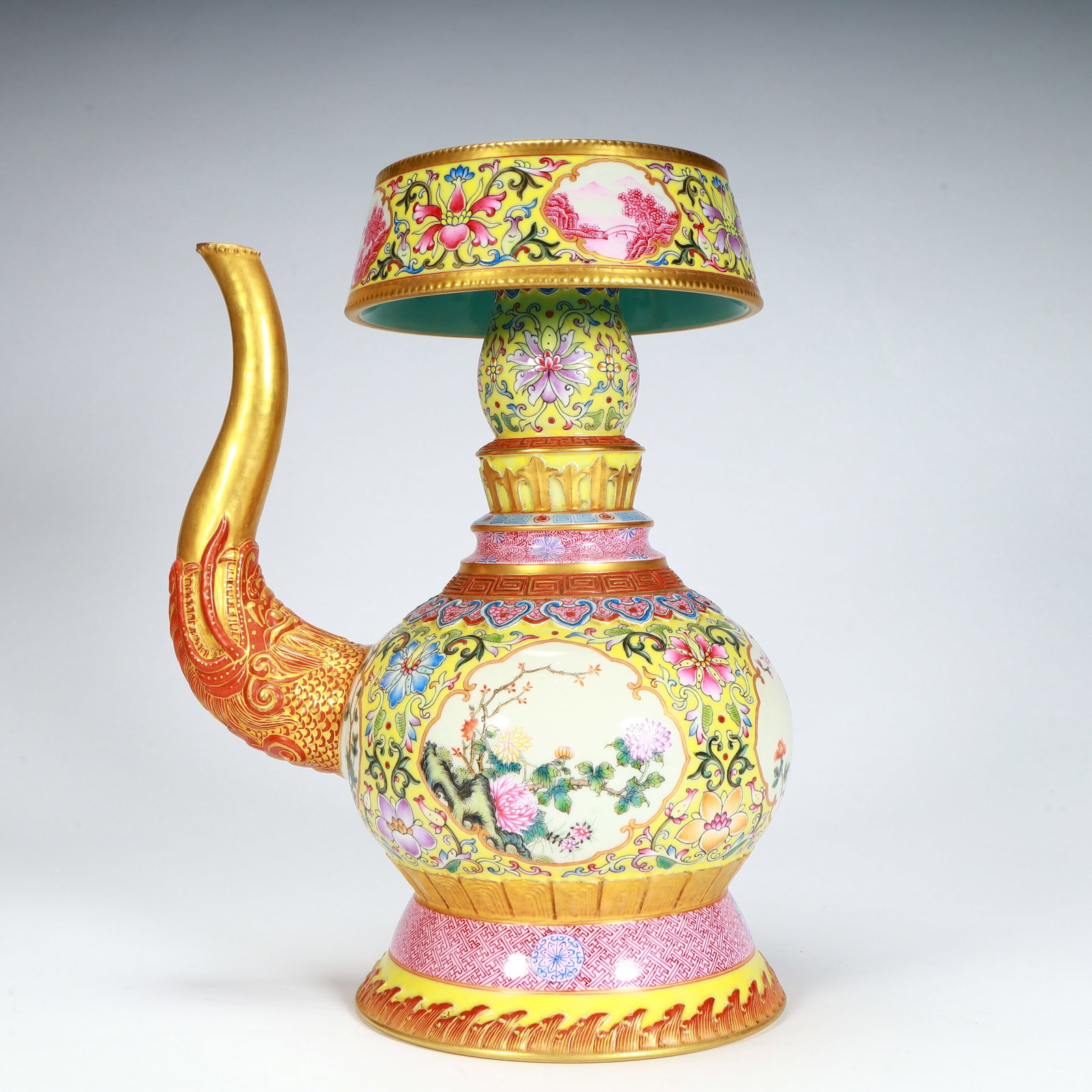 A fine Qing Dynasty Qianlong period yellow ground famille rose consecrated floral Benba teapot: Qing Dynasty Qianlong Period Yellow Ground Famille Rose Consecrated Floral Benba PotSIZE:H: 25cm L: 16.5cm W: 12cm W: 1384g(The Dimensions Of All Batches Are Manually Measured.If You Need More Detaile