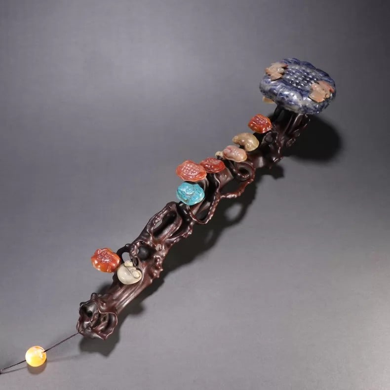 A fine Qing Dynasty rosewood ornament inlaid with a hundred treasures ruyi scepter (1 of 9)