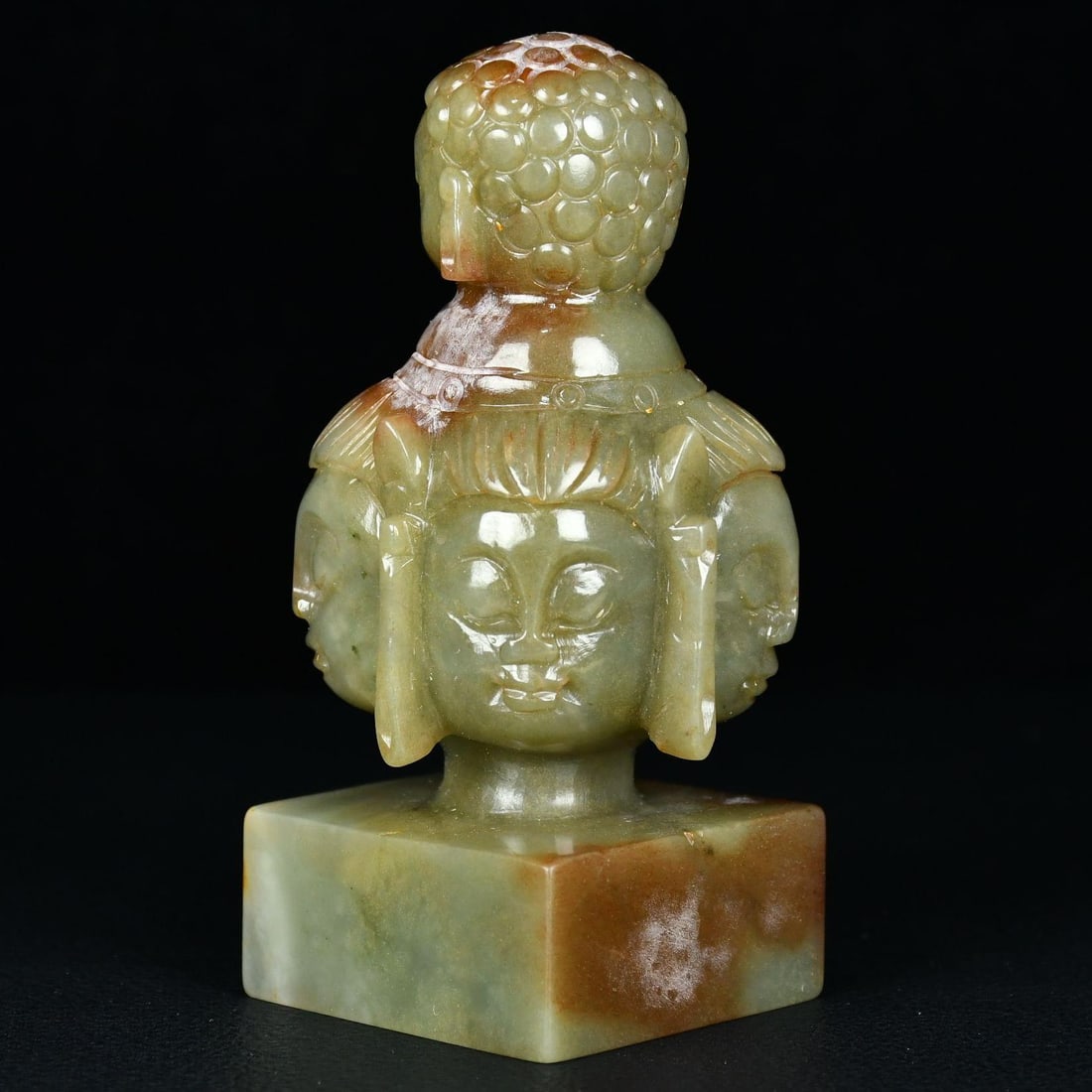A fine Qing Dynasty Hetian jade with multi-layered Buddha head jade seals on all sides: Qing Dynasty Hetian jade multi-layered Buddha head jade sealSIZE:H:10cm W:5cm W:281g(The Dimensions Of All Batches Are Manually Measured.If You Need More Detailed Information, Please Contact Our Custo