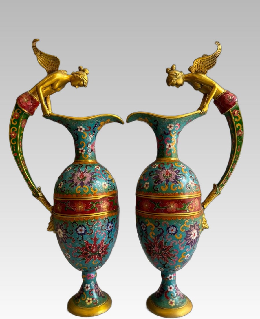 A beautiful Qing Dynasty copper-bodied handmade cloisonn?? cloisonn?? little angel vase: A handmade cloisonne cloisonne little angel vase with a Qing Dynasty bronze bodySIZE:L:22cm W:12cm H:48cm W:4.9kg(The Dimensions Of All Batches Are Manually Measured.If You Need More Detailed Informat