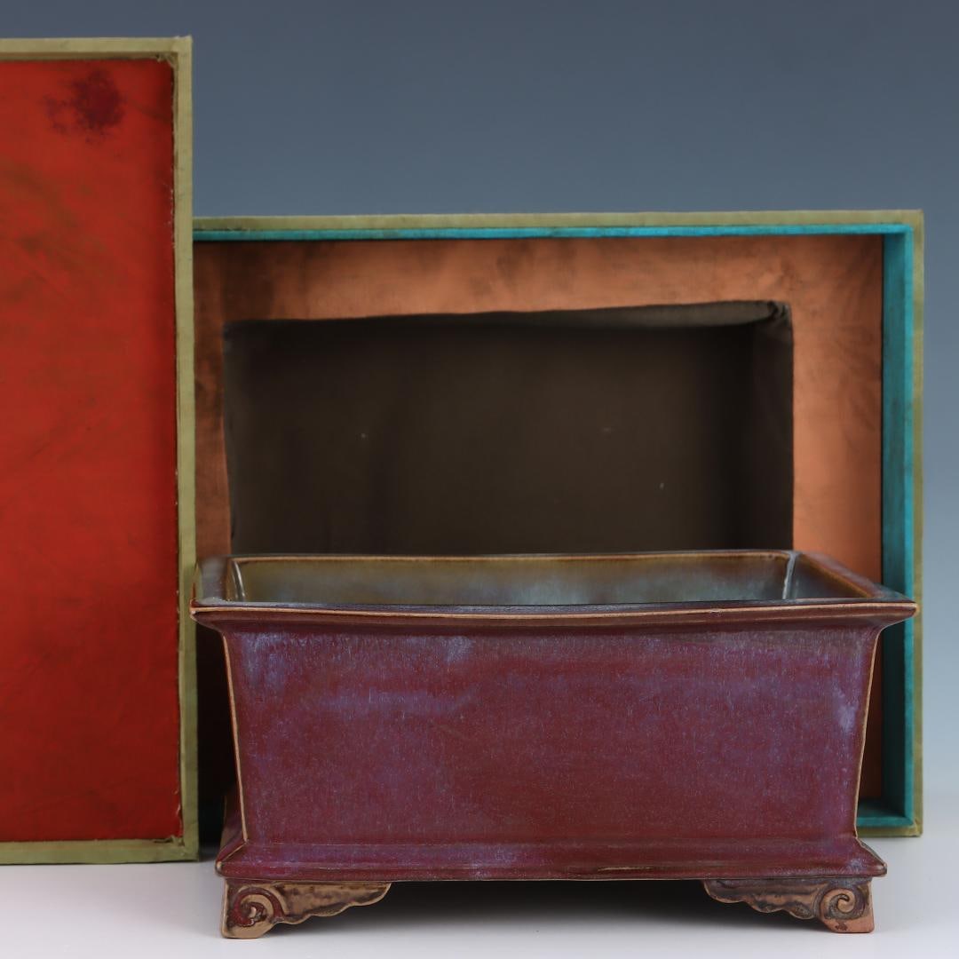 A fine Song Dynasty Jun kiln rose-purple glazed rectangular narcissus basin: Song Dynasty Jun kiln rose-purple glaze rectangular narcissus basinSIZE:H:11.8cm D:25cm(The Dimensions Of All Batches Are Manually Measured.If You Need More Detailed Information, Please Contact Our Cu