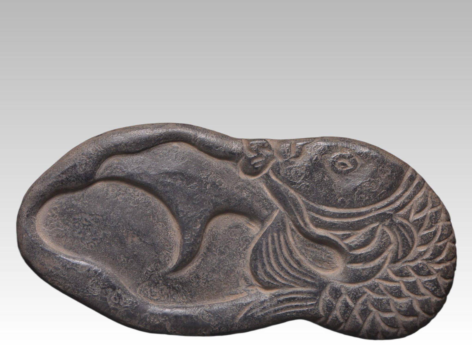A fine Qing Dynasty bluestone inkstone with 'Abundance Year After Year' (1 of 5)