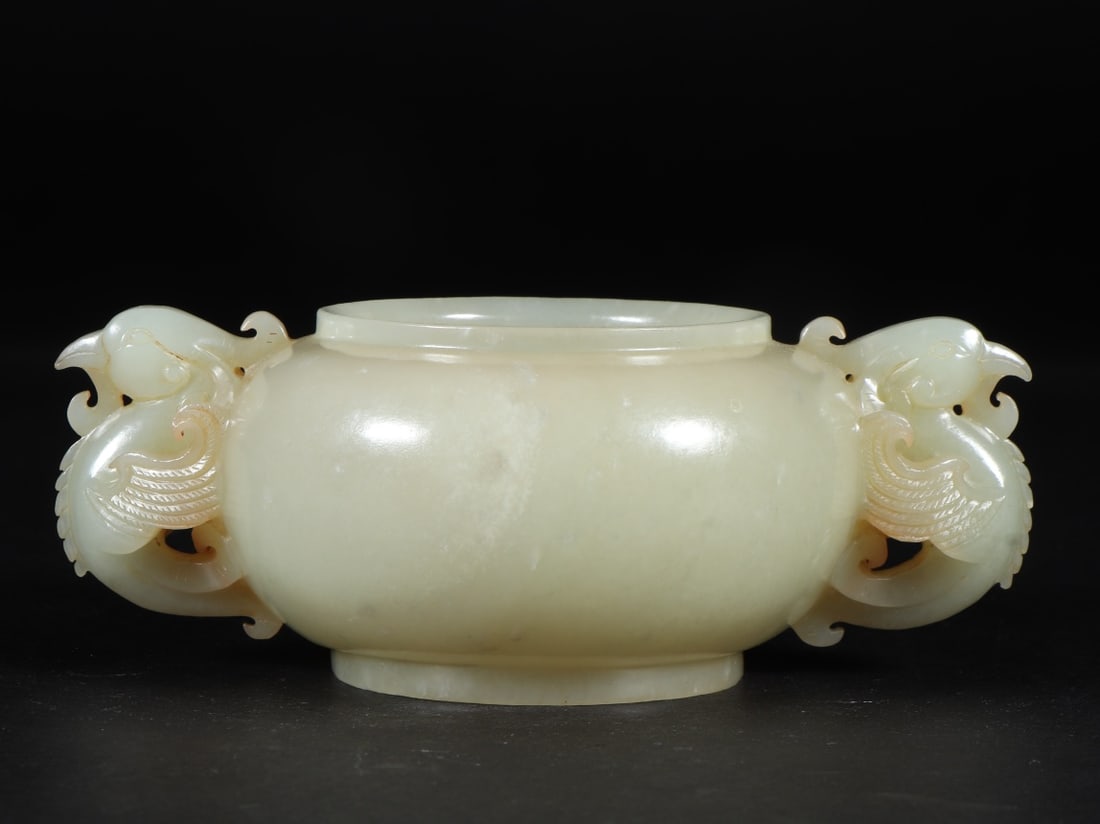 A fine piece from the Qing Dynasty Hetian jade seed jade with a phoenix head washed: Qing Dynasty Hetian jade seed jade with phoenix-head washed waterSIZE:L:13.2cm W:8.9cm H:5cm W:220g(The Dimensions Of All Batches Are Manually Measured.If You Need More Detailed Information, Please Co