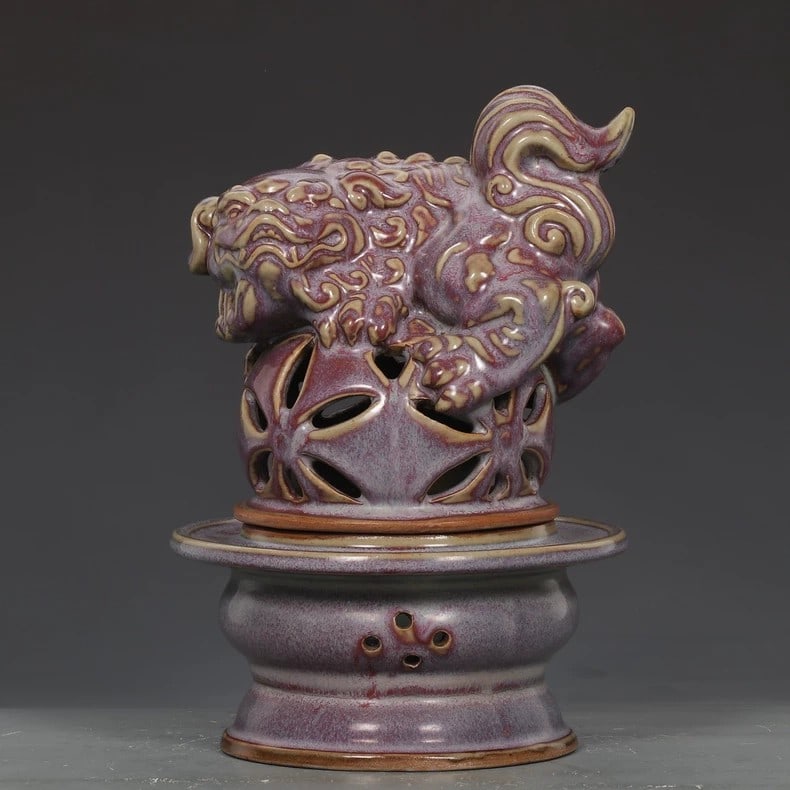 A fine Song Dynasty Jun kiln rose-purple glaze incense burner with an imperial inscription on lion: Song Dynasty Jun kiln rose purple glaze imperial lion incense burnerSIZE:H:24cm D:16cm(The Dimensions Of All Batches Are Manually Measured.If You Need More Detailed Information, Please Contact Our Cus