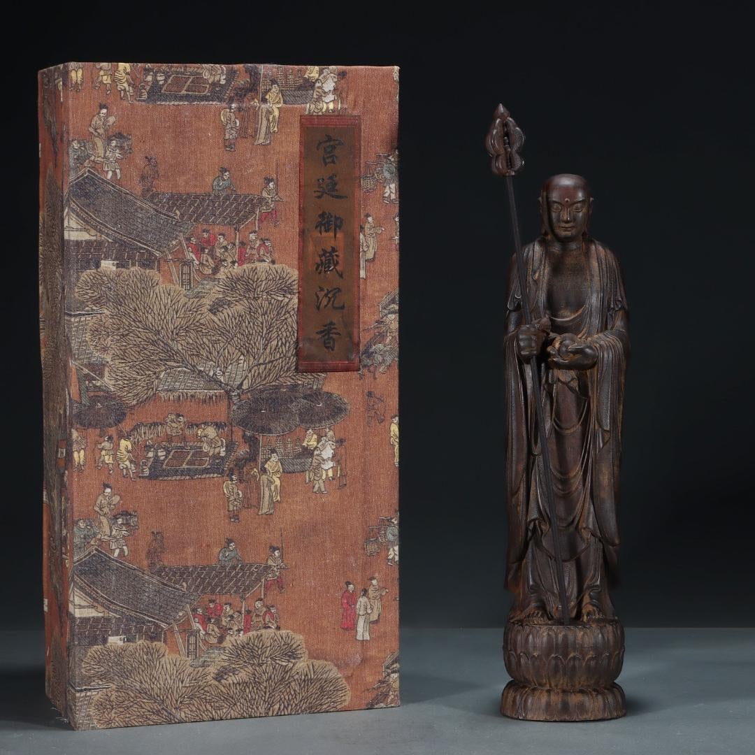 A fine Qing Dynasty agarwood K?itigarbha Buddha: Qing Dynasty Chenxiang K?itigarbha BuddhaSIZE:L:10.2cm W:8.6cm H:48.3cm(The Dimensions Of All Batches Are Manually Measured.If You Need More Detailed Information, Please Contact Our Customer Service B