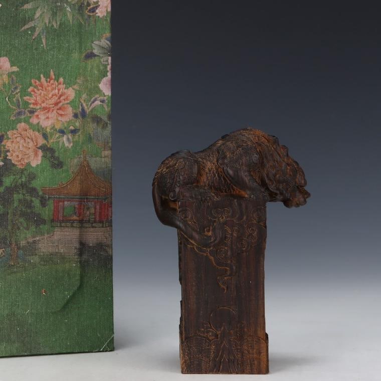 A beautiful Qing Dynasty agarwood mythical beast ornament: Qing Dynasty agarwood mythical beast ornamentSIZE:L:9.5cm W:5.5cm H:14cm(The Dimensions Of All Batches Are Manually Measured.If You Need More Detailed Information, Please Contact Our Customer Service 